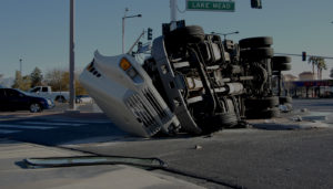 Semi-truck rolled over on its side in accident