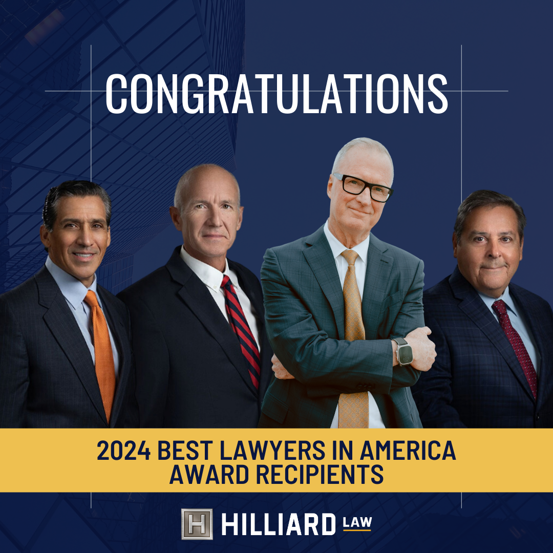 Image has a dark navy background. A mustard yellow banner runs across the lower section and reads "2024 Best Lawyers in American Award Recipients". Undernead the banner is the Hillard Law Logo. The image features four male attorneys. From Left, a hispanic male wearing a navy blue blazer, blue dress shirt and red tie. Next to him is a caucasian man wearing a dark suit, white shirt, and red tie. The third attorney is Bob Hilliard. He is taller than the rest, with white hair and is wearing black eye glasses. He's standing with is arms crossed and a slight smile on his face. He is also wearing a dark suit, which dress shirt, and yellow tie. The fourth man is hispanic, wearing a navy suit, blue dress shirt, and dark red tie.